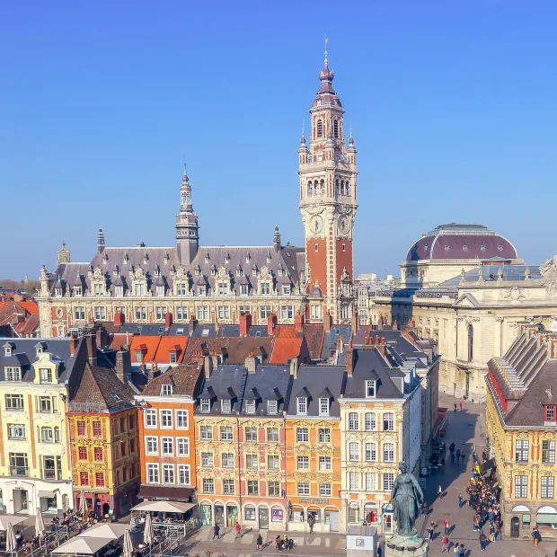 The Chamber of Commerce belfry and the Opera above the Flemish façades of central Lille